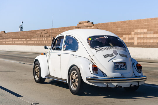 Oct 18, 2020 Antioch / CA / USA - Old Beetle driving on the freeway