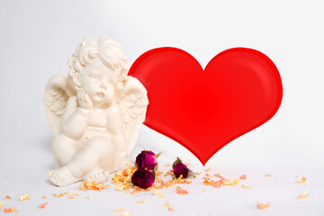 Valentine's Day. Angel on the background of the heart. Gold powder with roses