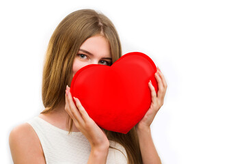 Cute girl holding red heart, close up isolated on white. Valentine love concept