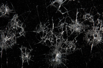 cracks on black glass background, broken abstract glass hole destruction concept