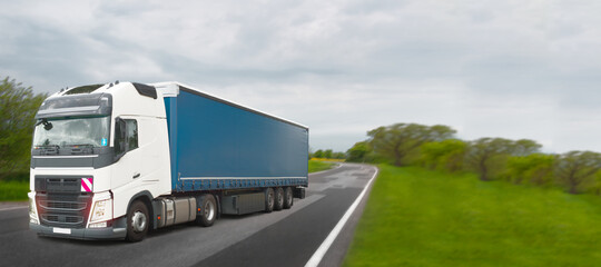 Truck with container on highway, cargo transportation concept. Logistics and warehouse transportation banner or web border