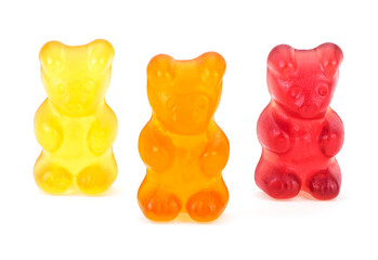 Three сolorful jelly gummy bears isolated on a white background. Sweet jelly marmalade teddy bears.