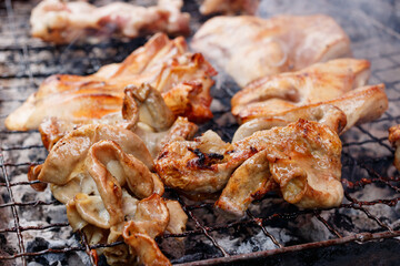 Grilled Pork Intestines and pork ears on the stove Thai style. as delicious food of Thai. Close up photography.