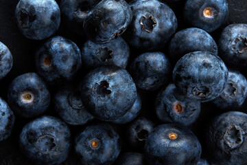 Fresh natural antioxidant blueberries pile, macro detailed close up