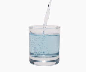 Pour water in glass isolated on white background with clipping path.