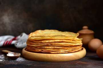  Stack of thin pancakes or crepes.