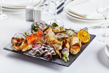 seafood platter. Assorted delicious seafood with vegetables. White background