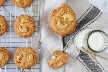 Cashew nut cookies with milk - top view pastry