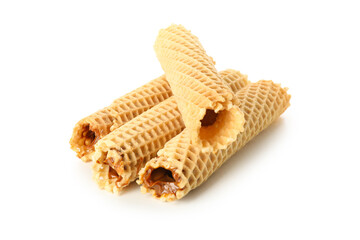 Wafer rolls with condensed milk isolated on white background