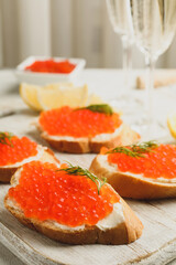 Naklejka na ściany i meble Concept of delicious eat with sandwiches with red caviar