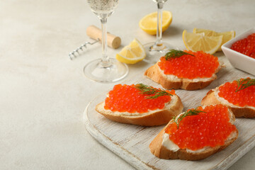 Concept of delicious eat with sandwiches with red caviar