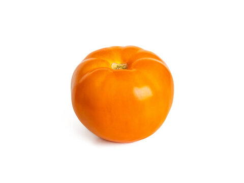 Yellow tomato isolated on white background