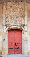 SALAMANCA, SPAIN, APRIL - 17, 2016: The Annunciation as the detail from gothic portal of romanesque church Iglesia de San Benito.