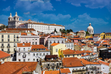 Fototapeta na wymiar Sao Vicente de Fora Monastery and dome of the National Pantheon seen from Portas do Sol in Lisbon, Portugal.