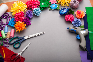 Obraz premium Woman modelling artificial flower from clay