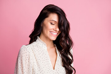 Photo portrait of dreamy overjoyed woman with wavy brunette hair wearing dotted white blouse...