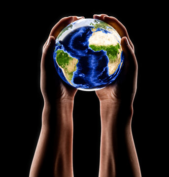 Earth in human hands - caring for the earth concept. with high details. Elements of this image furnished by NASA