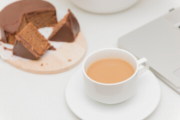Veinna Chocolate cake and a cup of coffee in the kitchen.
