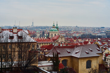Obraz premium Prague, Czech Republic - January 7 2021: Panorama view of historical centra of Prague from the Prague Castle area 