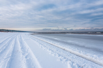 Truck Tracks on the Snow on a Baltic Sea Beach in Winter
