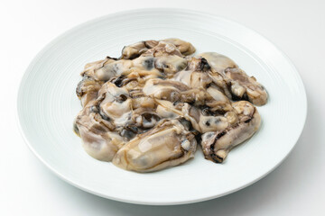 Raw oysters on a white background