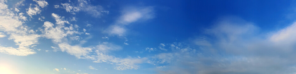 Panorama sky with beautiful cloud on a sunny day. Panoramic high resolution image.