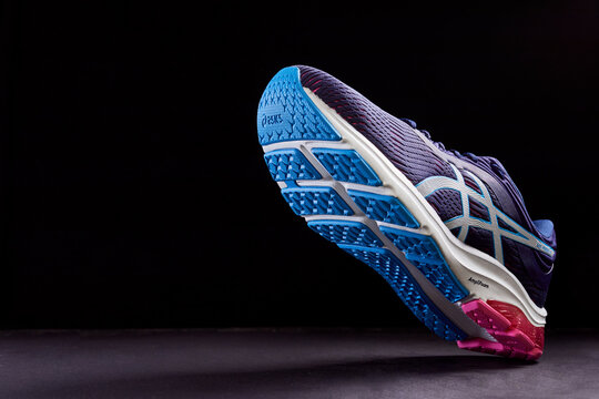 Zhlobin, Belarus - January 10, 2021: ASICS GEL PULSE Running Shoes. ASICS is a Japanese athletic equipment company which produces cushioning footwear.