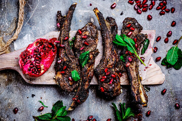 lamb chops with pomegranate sauce.top view © zoryanchik