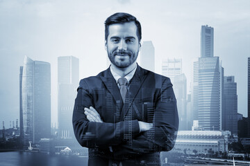 Prosperous European entrepreneur in suit in crossed arms pose. Singapore cityscape. The concept of problem solving. Financial downtown. Double exposure.