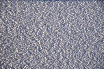 Snow sparkling in sun as background
