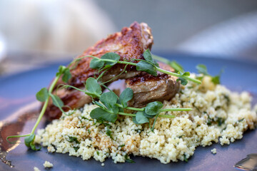 roast duck fillet with couscous and herbs