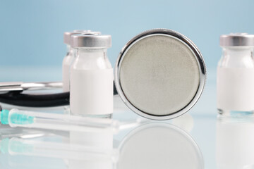 Corona Virus vaccine bottles. Vaccination, immunization, treatment to cure Covid 19 infection. Healthcare And Medical concept.