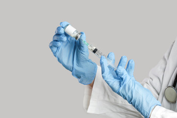 Scientist or medical worker holds Corona virus vaccine bottle.Vaccination, immunization, treatment...