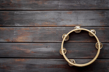 Musical instrument tambourine, top view. Music abstract background