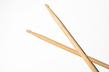 Drum sticks on white background, top view