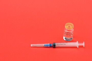Medical disposable syringe and vial with vaccine or drug. High