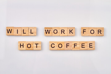 Will work for hot coffee. Alphabet wooden blocks with letters isolated on white background.