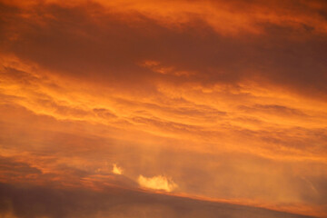 sunset with red clouds in the evening