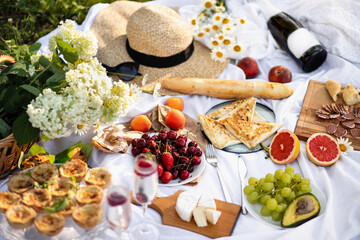 Summer picnic in the Park with champagne. Celebration