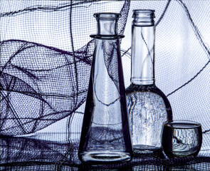Abstract still life with glass bottles