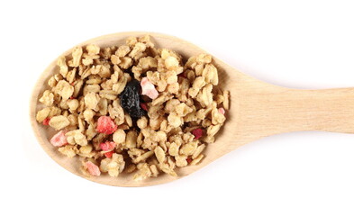 Dried red fruits cereal mix, fruity and crunchy muesli with raspberry, strawberry, cherry chunks isolated on white background, top view