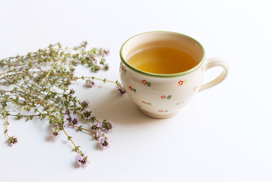 Thymus pulegioides tea and leaves. Tea is effective during diseases of the upper respiratory tract. Medicinal herb.The concept of healthy nutrition.