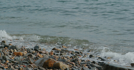 Sea wave over the rock