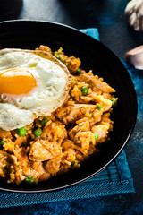 Spicy fried rice with chicken, kimchi and egg