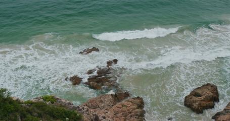 Sea wave and tropical island