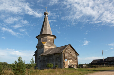 Fototapeta na wymiar Summer landscape with wooden church, Saminsky Pogost. Russia
