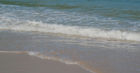 Sea wave splash on the beach