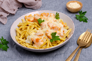 Pasta with pumpkin in white sauce