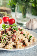 Spaetzle with fried bacon and onion