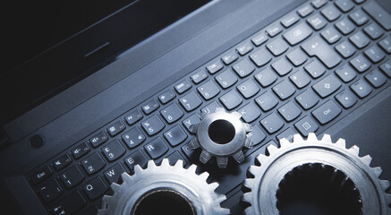 Metal gears mechanism on the laptop keyboard.